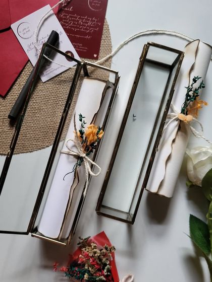 You don't have to settle for a WhatsApp proposal when you can receive a beautiful scroll letter like this. These glass boxes make the moment feel truly special.