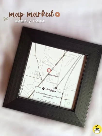 A "map marked memory frame" in a classic black frame. This piece captures a special location in Lower Parel and includes a Spotify soundwave to play a meaningful song.
