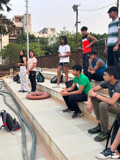 An engaged group of our athletes absorbing knowledge from their hero. These interactions are designed to inspire and motivate, connecting our swimmers' daily training to the possibility of achieving their own Olympic dreams.