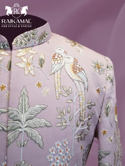 My designs often draw inspiration from nature, as seen in this pastel lavender Jodhpuri suit. The shoulder is adorned with delicate threadwork depicting a pair of birds and floral branches, showcasing a softer, more artistic side of men's ethnic couture.