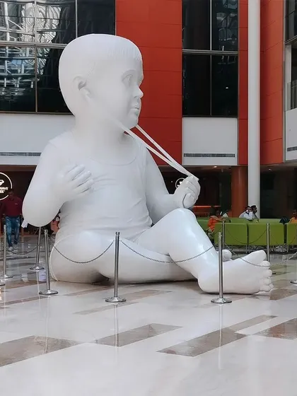 We created this larger-than-life baby sculpture for the Fortis Memorial Research Institute in Gurgaon. The clean, white finish and massive scale make it a memorable landmark in the hospital's main lobby, demonstrating our ability to produce high-impact public art.