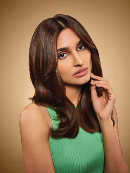 This look for a Schwarzkopf Professional campaign with Alaviaa Jaaferi showcases my 'skin-first' approach. The result is a radiant, dewy complexion that looks healthy and fresh on camera, a signature 'no-makeup' makeup style.