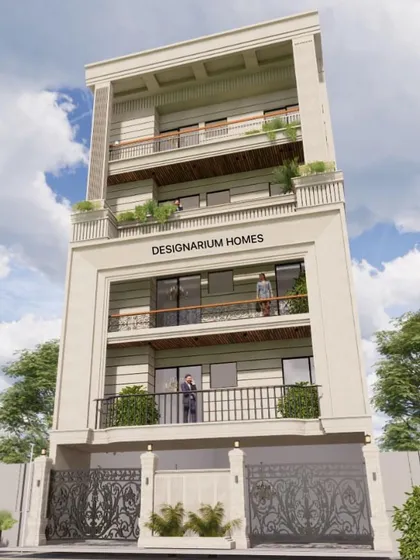 A full view of a classic facade design with intricate elements and a prominent logo placement. The design features symmetrical balconies and detailed cornices, projecting an image of established elegance.