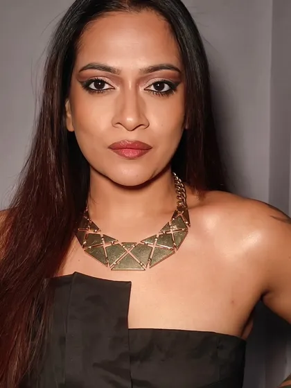 This is a look I created for myself that shows my personal love for glam. A sharp, winged eyeliner and a bold eyeshadow look is my go-to for a night out, and it’s a style I love creating for my clients too.
