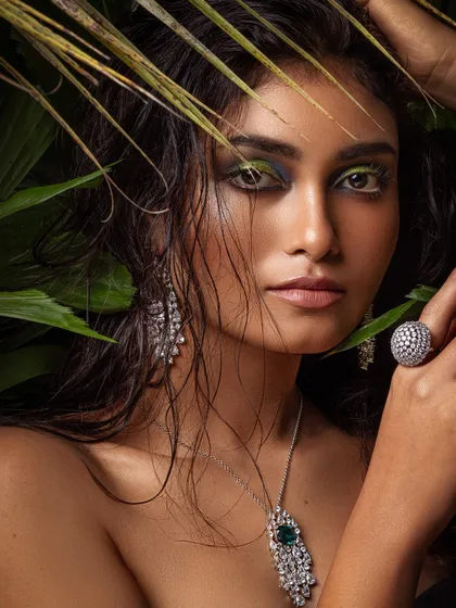 A bold, nature-inspired editorial shoot. I styled this look with wet hair and dramatic green eye makeup to complement the emerald and diamond jewellery set.