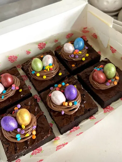 Another box of my popular egg nest brownies, ready for gifting. The shimmering chocolate eggs nestled in the chocolate frosting make them look as good as they taste.