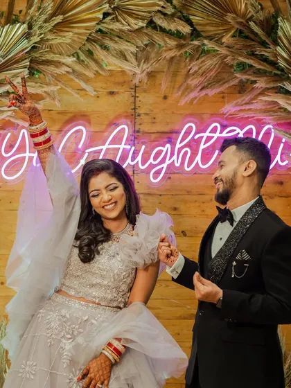 Couple goals! A fun, candid shot from the reception.