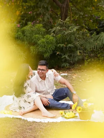 We always make time for couple's portraits during a family session. This shot captures the parents enjoying a quiet, romantic moment together during their outdoor picnic shoot.