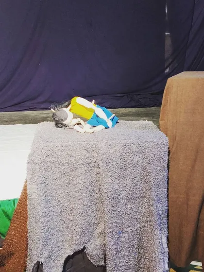 Even our puppets need a rest during rehearsals. This little one is waiting for its turn on the practice stage.