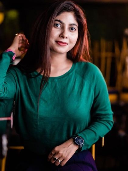 A guest posing at the bar.