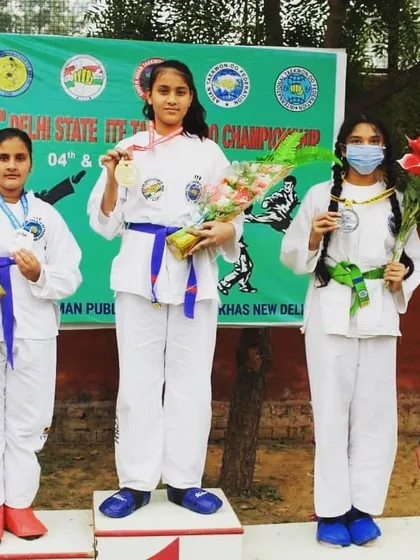 The results of our hard work are clear. My students are on the winners' podium at the 32nd Delhi State ITF Taekwon-do Championship, holding the medals they earned through discipline and practice.