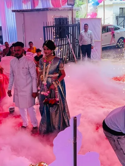 Another view of a baby shower entry I arranged. You can see my team managing the fog machine to create the perfect cloud effect as the couple makes their way to the stage.