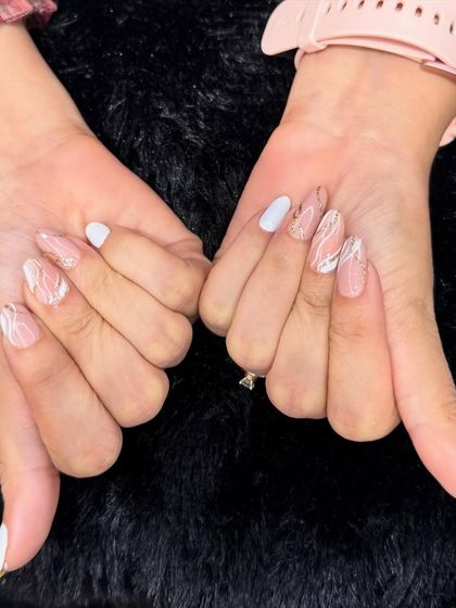 A delicate and modern design in white and nude. This set features abstract, wispy white lines over a sheer base for a chic and minimalist look.