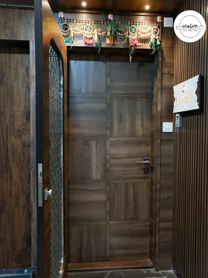 The view from inside, showing the solid wooden door that complements the safety door's design.