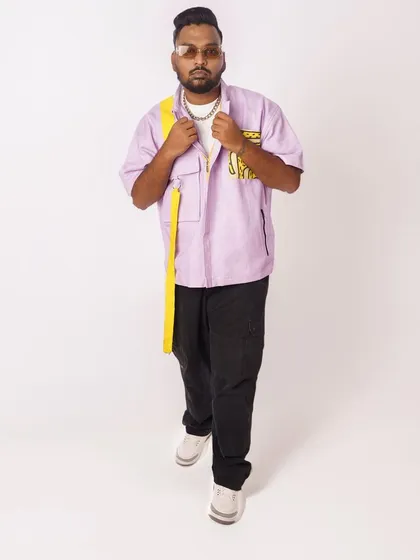 'Confident'. A full-body shot from a press shoot, showcasing a unique, fashion-forward look.