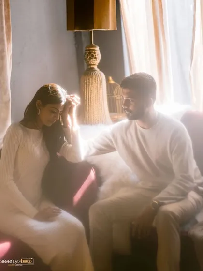 A moment of tenderness, captured in the hazy, dreamlike light of a cozy room in Kashmir. It’s a soft, poetic image that feels like a memory you can step into.