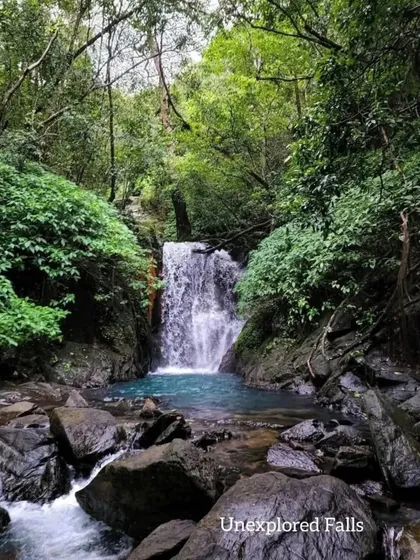 An unexplored waterfall with a brilliant blue pool, one of the many secrets we uncover on our offbeat trips in Uttara Kannada.