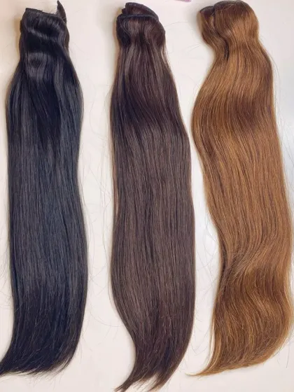 This image displays three of my most requested shades of straight hair extensions: natural black, dark brown, and a warm light brown. Each bundle is made from single-donor hair for consistent quality.