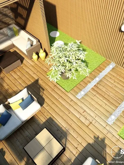 A different perspective of the rooftop garden, showing the thoughtful layout that combines wooden decking with artificial grass and comfortable seating arrangements.