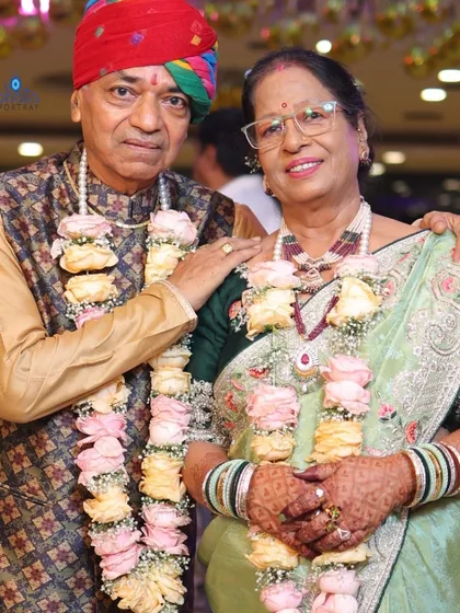 A beautiful portrait of a couple celebrating their 50th wedding anniversary. My family photography services extend to all major milestones, capturing the enduring love that holds a family together.