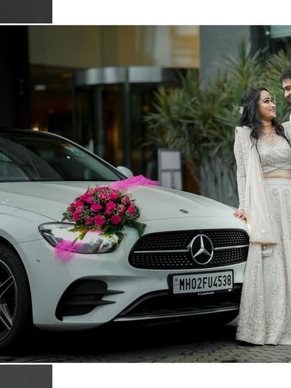 A stylish portrait of the couple with their decorated wedding car. This type of shot adds a touch of modern luxury and celebration to the wedding album.