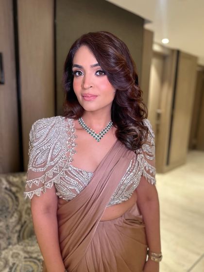 A close-up of my quick glam. The focus is on a soft smokey eye and glowing skin, a versatile look that works for any special occasion.