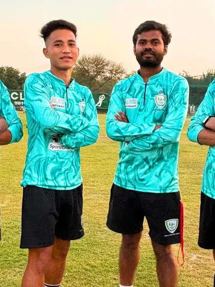 A group photo of our dedicated coaches in their new jerseys, ready for the summer season.