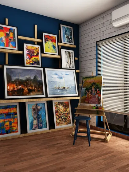An inspiring art room with a deep blue accent wall and custom wooden shelves designed to display finished canvases. The space is set up to encourage creativity.