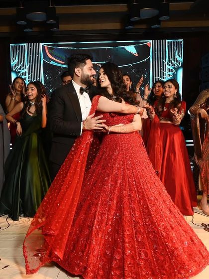 A happy couple surrounded by their cheering friends and family after their performance. This is the kind of joyful moment I strive to create.