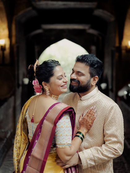 A close-up within the temple corridor, this portrait is all about their loving gaze. The soft light and their gentle expressions create a deeply romantic and intimate feel.
