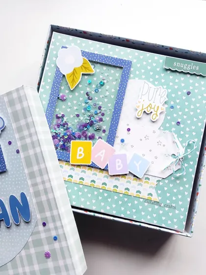 Welcoming a new baby is pure joy, and this scrapbook was made to capture just that. I designed this keepsake book with a fun shaker window and adorable baby boy theme, creating a special place to save all those precious first moments.