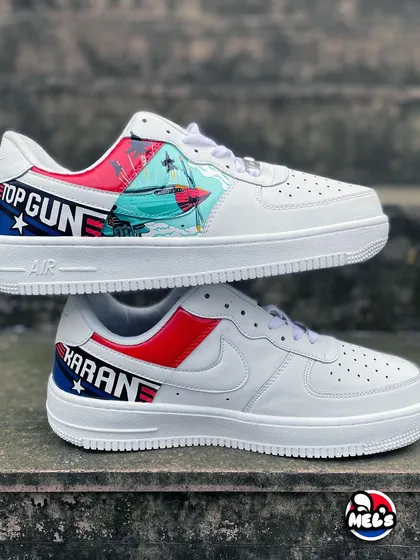 A side-by-side display of the outer designs of the 'Top Gun' custom pair, showing the personalized name and the jet artwork.