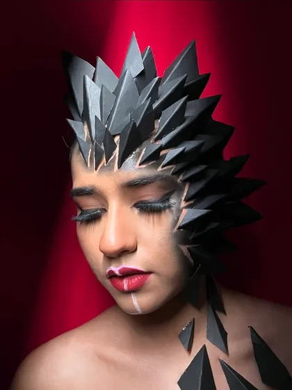 Another beautiful shot capturing the artistic detail of this creative makeup.