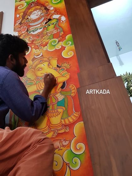 One of our artists working on a detailed Ganesha mural. This traditional Kerala style of painting is perfect for pooja rooms and spaces of worship.