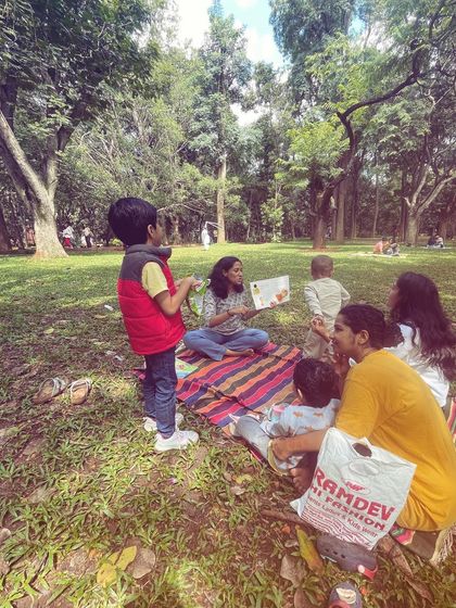 A series of photos from our 'Storyscapes 16' session, capturing the authentic, unposed moments of our circle. You can see children listening, playing, and interacting naturally, which is the essence of our child-led storytelling approach.