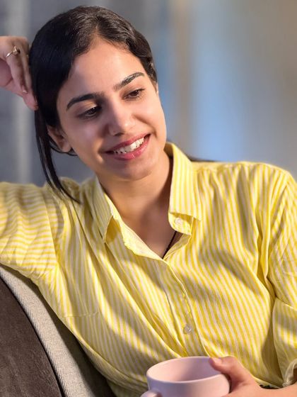 A close-up portrait with a warm smile. This image highlights my ability to connect with the viewer in a simple, direct, and engaging way.