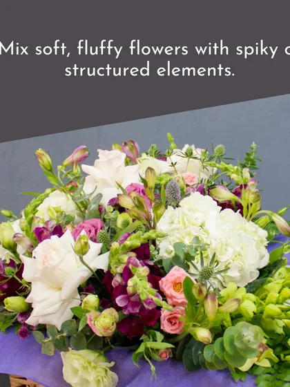 This bouquet is a great example of mixing soft, fluffy flowers like hydrangea with more structured elements to create a rich, textured look.
