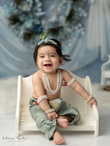 A blissful smile from this little Krishna. The joy is absolutely radiant.