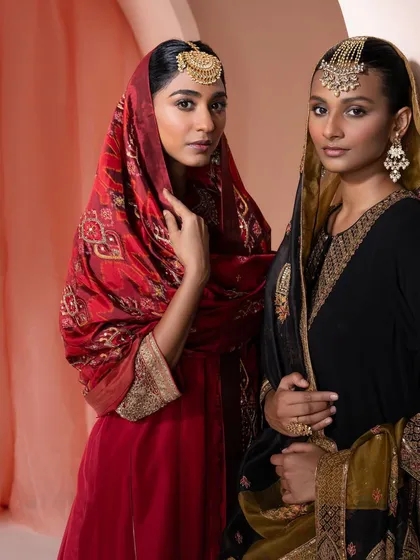 An intimate portrait of two models from a festive collection. I styled them in rich velvet ensembles with traditional head jewelry, creating a warm, regal mood that speaks of heritage and sisterhood.