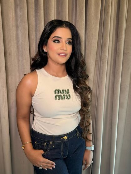 A closer look at this fun and glamorous makeup. The pop of green kohl under the snatched liner adds an unexpected twist to the classic winged eye.