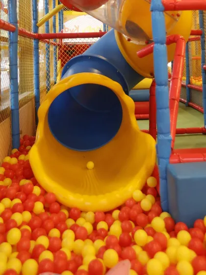 This tunnel slide offers a twisting, turning adventure before landing in the ball pit. It’s a favorite for kids who love a little mystery with their fun.