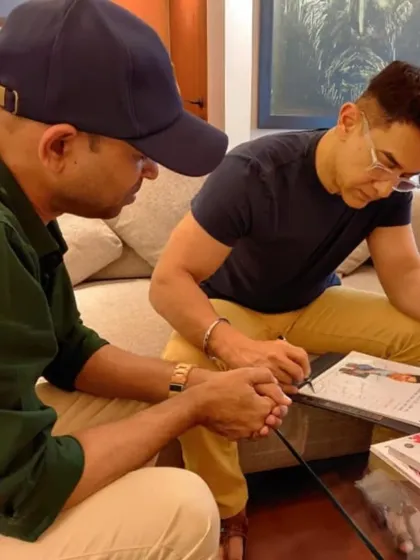 Aamir Khan ji signing a copy of the calendar, a moment I will always treasure.