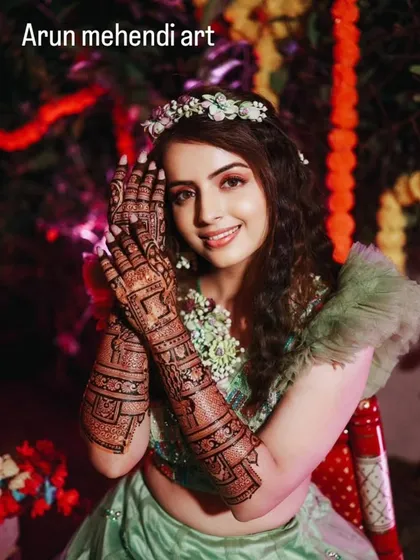 Nothing makes me happier than a smiling bride. Here is a happy client showing off her intricate bridal mehendi, ready for her big day.