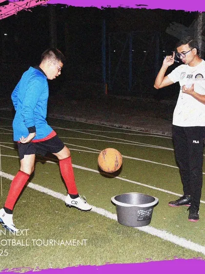 A player participating in a skills challenge at the GenNext Football Tournament.