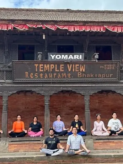 A moment of shared stillness. Our group meditates together in the historic city of Bhaktapur, Nepal.