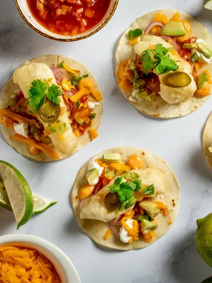 Our soft shell tacos are packed with bold flavours, from crunchy avocado and Texas pulled chicken to beer-battered fish and chimichurri mushrooms.