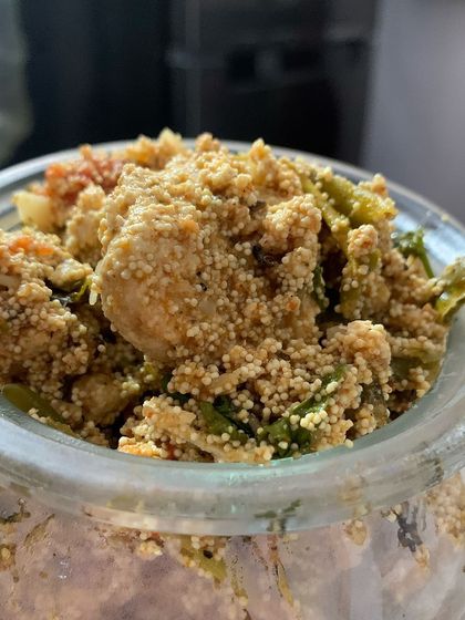 This is a special dish of fish eggs cooked with lots of green chillies, bamboo shoot, and Sichuan pepper. The poppy seeds give it a unique texture.
