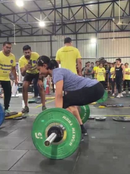 Another angle of a competition deadlift. Notice the flat back and engaged posterior chain, key technical points we emphasize for both safety and power.