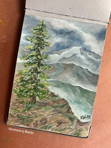 This sketchbook view shows my watercolor painting of a lone pine tree against a dramatic, cloudy mountain range. It captures the feeling of solitude and the raw beauty of nature.