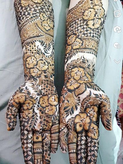 A beautiful example of a negative space floral design. The dark background makes the flowers pop, creating a stunning 3D effect for a full bridal look.